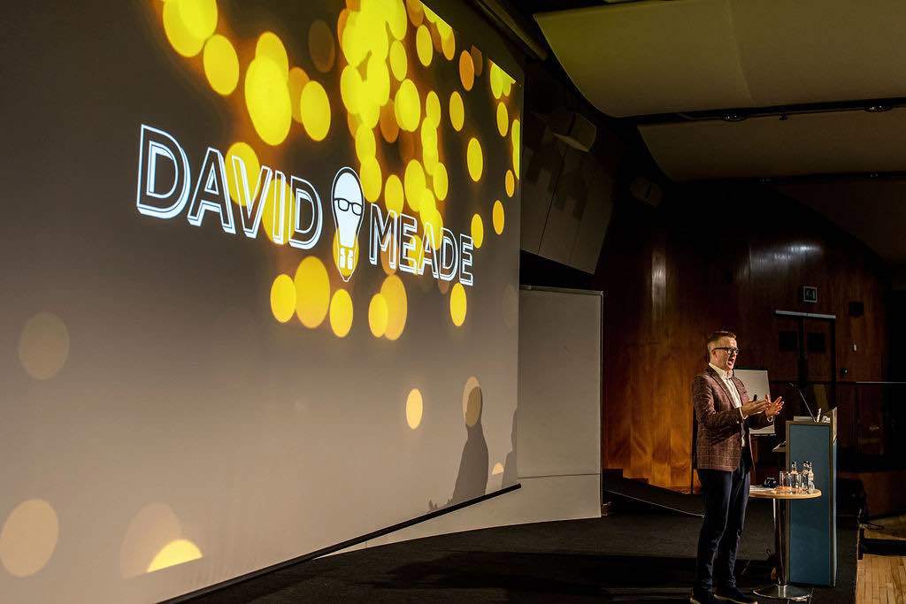 David on stage | Keynote speaker hosting | David Meade